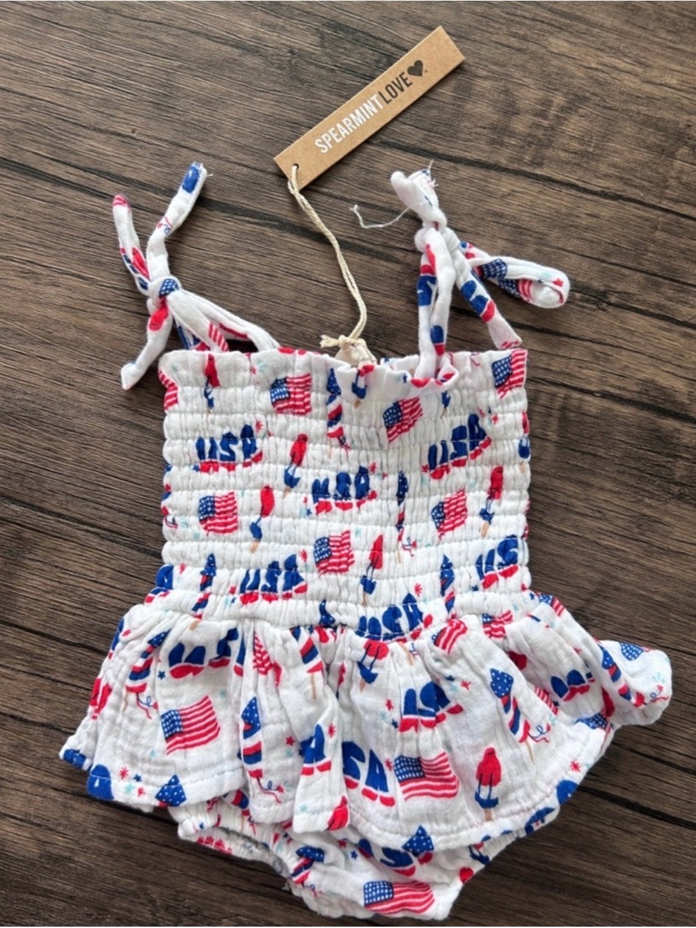 SpearmintLOVE Toddler Girls' White USA Flag Smocked One-Piece Bodysuit